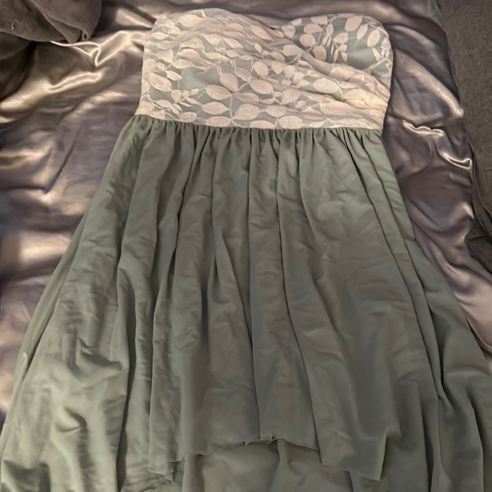 Strapless light green dress with white flower back